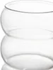 A close-up of a clear glass tumbler with a ribbed design. Podgląd zdjęcia produktu