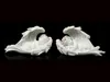 Two white angel figurines sleeping on a black background. Produktbild-Vorschau