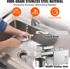 A person is cleaning a part of an oil press machine in a sink, with the machine and its accessories shown in the foreground and background. Produktbild-Vorschau