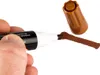 A hand holding a brown marker and drawing a line on a white background. The cap of the marker is off and visible. Podgląd zdjęcia produktu