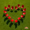Red chairs arranged in a heart shape on a green lawn. Anteprima dell’immagine prodotto