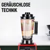 A red blender with a clear container filled with various types of beans and grains, placed on a kitchen counter. Produktbild-Vorschau