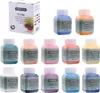 A collection of 12 acrylic airbrush paint bottles and their packaging. Anteprima dell’immagine prodotto