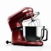 A red stand mixer with a silver bowl and whisk attachment is shown against a white background. Produktbild-Vorschau