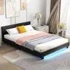 A bedroom scene with a black upholstered bed frame. Náhled obrázku produktu