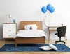 A child's bedroom with a bed, dresser, and desk. Produktbild-Vorschau