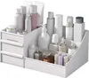 A white makeup organizer filled with various cosmetic bottles and containers. Náhľad obrázku produktu