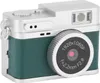 A close-up studio shot of a small, retro-style digital camera. Náhľad obrázku produktu