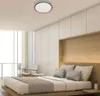 A modern bedroom with a bed, chairs, and a ceiling light. Náhled obrázku produktu