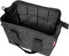 An open black bag with a polka dot pattern, showing its interior compartments. Anteprima dell’immagine prodotto