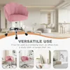 A pink velvet chair is shown in the foreground, with a blurred background of a modern living room. Below the chair are three smaller images showing the chair in different settings, along with text describing its versatility. Produktbild-Vorschau