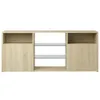 A front view of a light brown TV stand with glass shelves against a white background. Náhled obrázku produktu