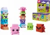 A collection of colorful toy building blocks shaped like animals, stacked and arranged on a white background, with a product box in the background. Produktbild-Vorschau
