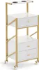 A white and gold rolling trolley with drawers and cup holders. Produktbild-Vorschau