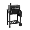 A black charcoal grill on a white background. Produktbild-Vorschau