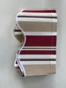 A folded awning valance with a striped pattern. Produktbild-Vorschau