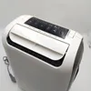 A close-up, angled view of a white and black DeLonghi dehumidifier against a white background. Voir les images du produit