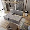 A modern living room with a sectional sofa, coffee table, and decorative elements. Produktbild-Vorschau