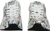 A pair of white sneakers with a cartoon-like print is shown from the front. Produktbild-Vorschau