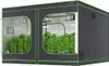 A grow tent with plants inside, illuminated by grow lights. Voir les images du produit