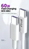 Two white USB-C cables are shown against a light gray and white background, with text overlay indicating product features. Produktbild-Vorschau