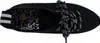 A top-down view of a black sneaker with white polka dot laces. Produktbild-Vorschau