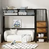 A bunk bed with a sofa underneath and stairs on the side, decorated with children's items. Anteprima dell’immagine prodotto