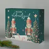 A teal-colored advent calendar box with nutcracker figures and Christmas trees, presented on a light gray surface with a pine sprig in the foreground. Produktbild-Vorschau