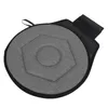 A round, gray seat cushion with a hexagonal pattern and a black strap on a white background. Produktbild-Vorschau