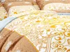 A close-up view of bedding with a patterned design. Náhľad obrázku produktu