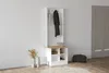A hallway stand with coats and accessories in a room. Produktbild-Vorschau