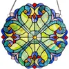 A stained glass suncatcher hanging against a white background. Produktbild-Vorschau