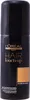 A black spray bottle with gold lettering and a swatch of warm blonde color. Voir les images du produit