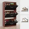 A wooden shoe cabinet with three flip-down drawers, showcasing different types of shoes. Illustrations on the right indicate shoe storage methods. Produktbild-Vorschau