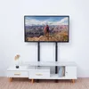 A TV stand with a TV mounted on it, placed against a white wall. Podgląd zdjęcia produktu
