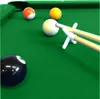 A close-up view of a pool table with several billiard balls and cues. Produktbild-Vorschau