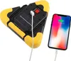A yellow and black triangular warning light with a solar panel is shown charging a smartphone. Voir les images du produit