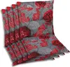 A stack of chair cushions with a floral pattern. Produktbild-Vorschau