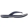 A side view of a navy blue flip-flop with white trim. Produktbild-Vorschau