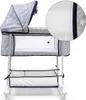 A baby bassinet with a canopy and storage basket. Náhled obrázku produktu