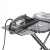 A close-up shot of a black steam iron resting on a metal ironing board with a stack of folded patterned fabric next to it. Produktbild-Vorschau