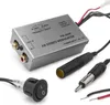 A close-up shot of an FM stereo modulator and its accessories on a white background. Produktbild-Vorschau