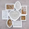 A collage of white photo frames arranged on a gray textured background. Produktbild-Vorschau
