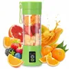 A portable USB blender filled with fruit, surrounded by various fruits and a splash of juice. Náhled obrázku produktu