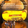 A group of people are looking at a large screen displaying an orchestra performance. Produktbild-Vorschau