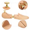 A collage of close-up images showing the details of a wooden shoe stretcher. Náhľad obrázku produktu