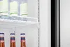 Interior view of a refrigerator with bottles on shelves. Produktbild-Vorschau