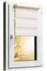A white window frame with a beige and cream roller blind partially lowered, showing a sunlit tree with yellow leaves outside. Produktbild-Vorschau