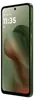 A smartphone with a green case and a wallpaper displaying abstract shapes. Anteprima dell’immagine prodotto