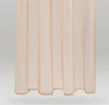 A close-up view of a beige, sheer curtain with vertical pleats. Anteprima dell’immagine prodotto